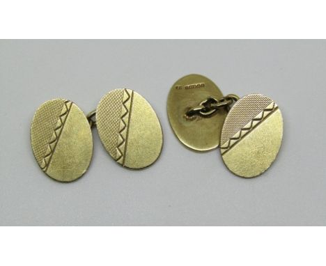 Pair of 9ct engine turned oval cufflinks, 10g total