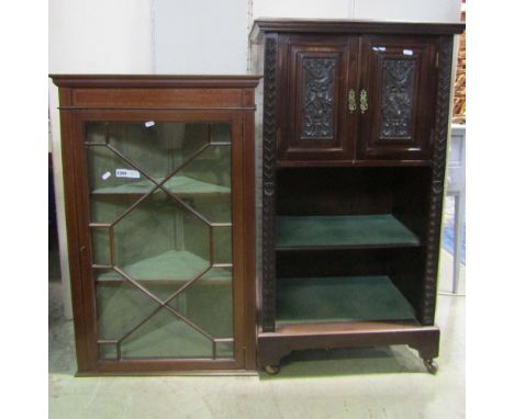 An inlaid Edwardian mahogany freestanding corner cabinet in the Georgian style enclosed by two doors, the upper section astra