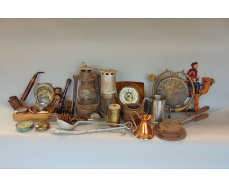 A box of interesting items to include military items such and trench art, barometer, storm lamp, pipes, cast iron, two pocket