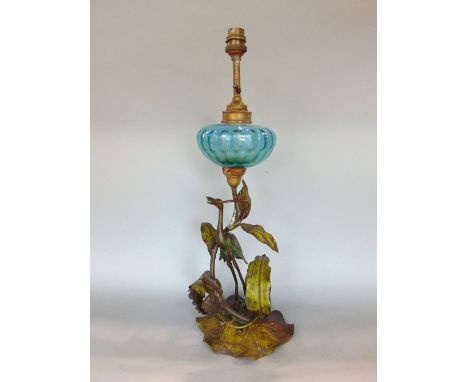 Possibly French bronzed spelter figural oil lamp, cast as a crane on the back of a tortoise amidst reeds, with blue glass res