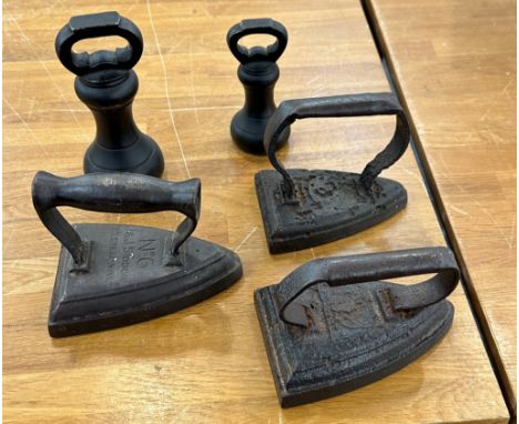 Selection of vintage flat irons and weights