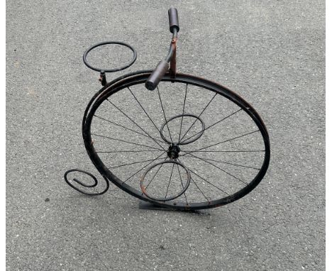 Vintage penny farthing metal planter measures approx 31 inches tall
