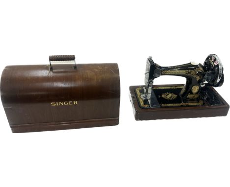 Vintage cased Singer sewing machine with key