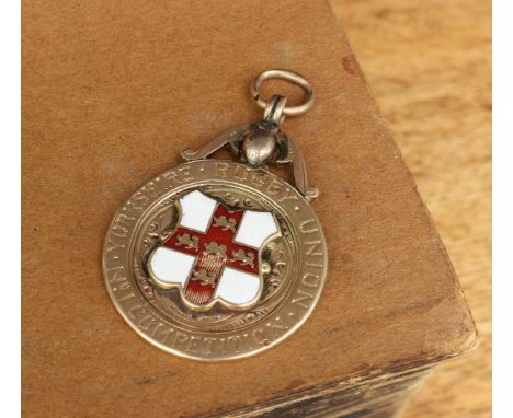 Sport, Rugby - a late Victorian 9ct gold and enamel fob medal, inscribed to the front 'YORKSHIRE RUGBY UNION NO1 COMPETITION'