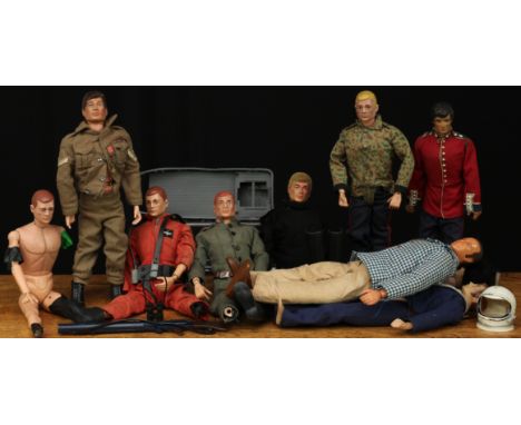 A 1970's Palitoy Action Man with brown flock hair, blue eyes, unboxed; other Palitoy Action Man figures and similar action fi