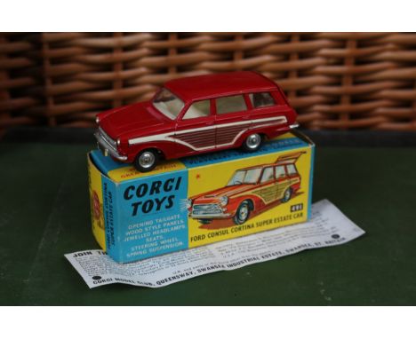 Corgi Toys 491 Ford Consul Cortina super estate car, red body with faux wooden panels, white interior, spun hubs, boxed with 