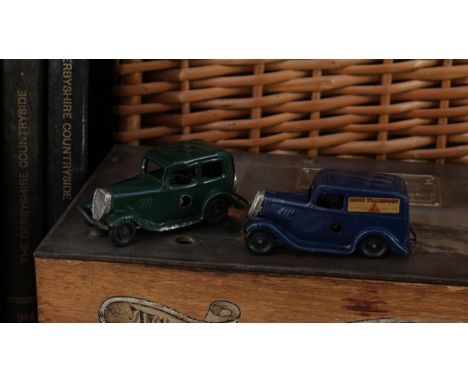 Tri-ang Minic (Lines Brothers) tinplate and clockwork 1M Ford saloon, dark green body, unboxed; Tri-ang Minic (Lines Brothers