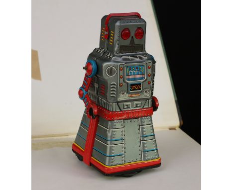 A 1960's KO Toys (Japan) novelty tinplate friction powered Atom robot, printed detail, fitted with a fixed type key to the re