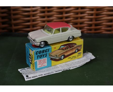 Corgi Toys 234 Ford Consul Classic, cream body with pink roof, lemon yellow interior, spun hubs, boxed with original 'JOIN TH