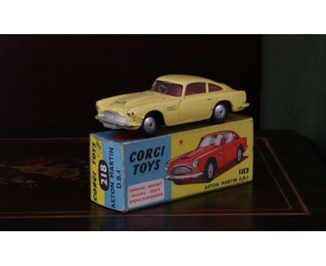 Corgi Toys 218 Aston Martin D.B.4, lemon yellow body, red interior, flat spun hubs, boxed with original 'JOIN THE CORGI  MODE