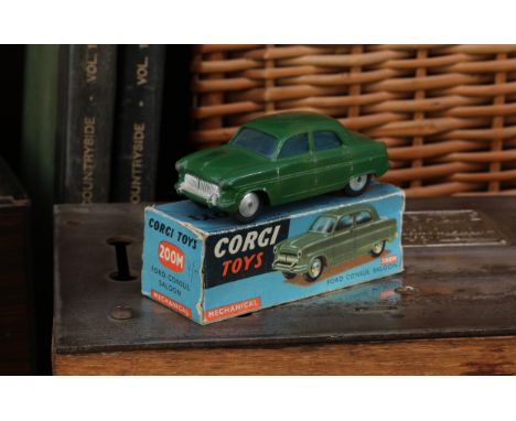 Corgi Toys 200M Ford Consul saloon with windows, dark green body, flat spun hubs, boxed