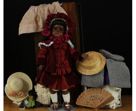 An Armand &amp; Marseille (Germany) bisque head and ball jointed painted composition black doll, sleeping brown glass eyes, p