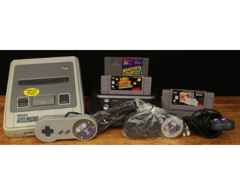 Vintage Gaming and Technology - a Nintendo Super Nintendo entertainment system, model no.SNSP-001A(UKV), with controller; Mon