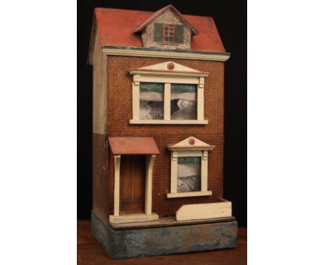 A late 19th century/early 20th century dolls house, painted wooden construction with lithographed paper exterior, faux front 