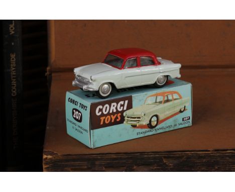 Corgi Toys 207 Standard Vanguard III saloon, two tone pale green and red body, stickers applied to hubs, boxed - later reprod