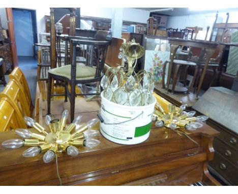 A BRASS LIGHT FITTING WITH TEAR SHAPED GLASS DROPS AND A PAIR OF BRASS COLOURED MODERN LIGHT FITTINGS (3) 