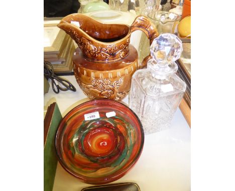 MDINA STUDIO GLASS CIRCULAR BOWL, 8" DIAMETER, CUT GLASS SPIRIT DECANTER AND A LARGE BROWN GLAZED POTTERY HUNTING JUG, 9" HIG