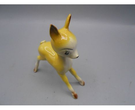 Ceramic Bambi 5 inches wide 6 inches tall ( no obvious damage )