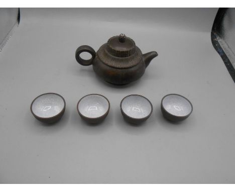 Japanese Ceramic Teapot 3 inches tall and 4 Saki cups