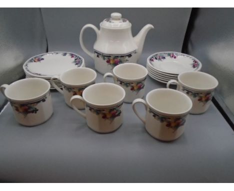 Royal Doulton 'Autumns glory' teapot, 6 cups and saucers, 8 side plates
