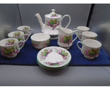 Royal Albert 'village green' dinner service comprising 4 dinner plates, 6 side plates, 6 cake plates, 6 bowls, teapot, sugar 