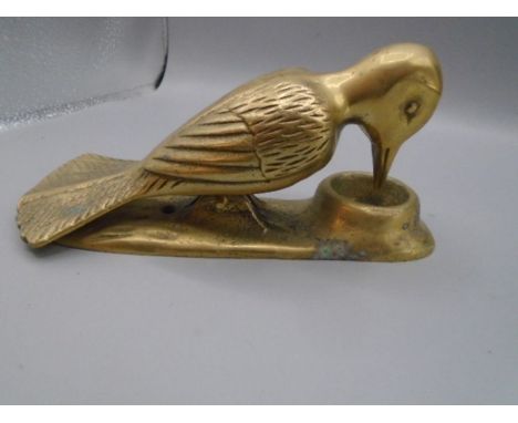 Brass woodpecker door knocker