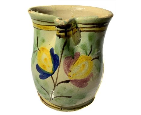 Jug, majolica of Caltagirone first 900. Decorated with flowers. H 21 cm.
