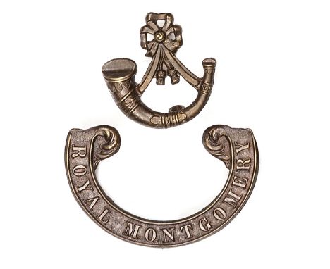 A good OR’s 2 part darkened bugle/scroll forage cap badge of the Royal Montgomery Militia. Near VGC Plate 1                  