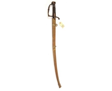 An early 19th century French infantry officer’s sword, flat curved blade 31½”, brass stirrup hilt with ovoid langets, knopped
