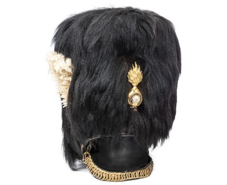 A Vic officer’s bearskin cap of The Royal Fusiliers (City of London Regiment), white feather plume on right side, graduated l
