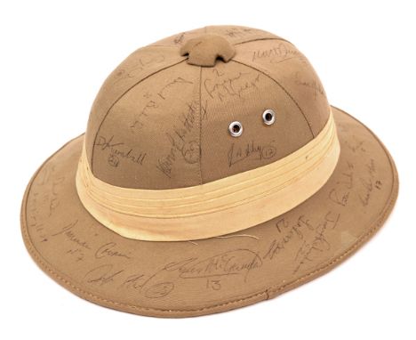 A souvenir khaki tropical helmet,  buff silk headband, ventilator top, leather lining and chinstrap, inscribed in pencil/biro