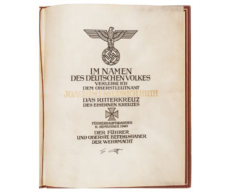 A scarce Third Reich Knights Cross of the Iron Cross presentation document on vellum to (Oberstleutnant) Joachim Friedrich Hu