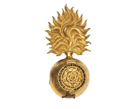 A Victorian officer’s gilt bearskin grenade badge of The Royal Fusiliers (City of London Regiment), bearing the Rose within p