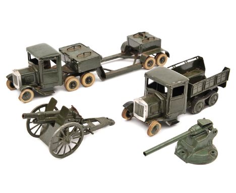 A small quantity of Britains military items. An articulated under-slung heavy duty lorry No.1641. 1st type with driver, metal