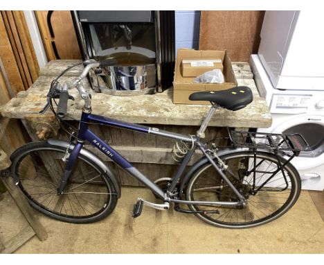 A Raleigh Pioneer hybrid bike