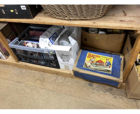 Books, a Bayko building set and vintage tins