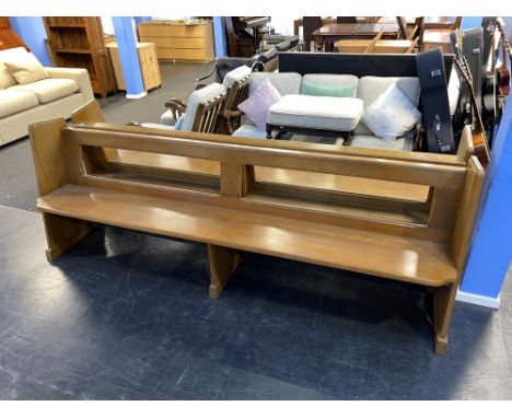 A light oak pew