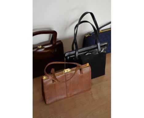 Four 1960s frame bags in good condition. A 1960s black patent style featuring playful pout shaped clasp, deep green lining, c