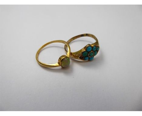 An Antique 18 ct Gold and Opal Ring Size O, the opal is 6.6 x 5.3 mm together with a 14ct turquoise ring (one stone missing) 