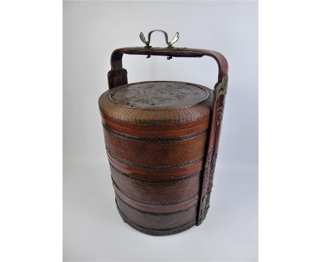 A Traditional Chinese Triple Tiered Woven Bamboo Marriage Basket, each basket finely woven in various patterns, carved wooden