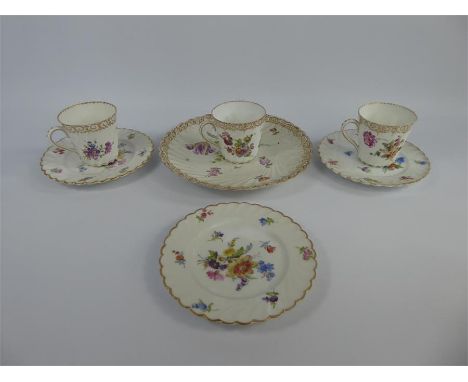 Miscellaneous Dresden Porcelain, comprising three cups and saucers, four sandwich plates, all marked Dresden, together with a