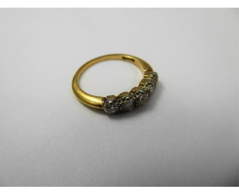 An Antique 18 ct Yellow Gold and Platinum Five Stone Diamond Ring, the ring set with 45/50 pts of old cut dias, size N, appro