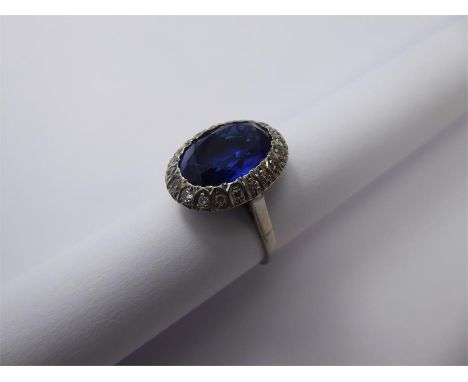 An 18 ct Royal Blue Sapphire &amp; Diamond Ring, the oval sapphire approx 13 x 10mm , approx 20 pts of 8-cut dias, size P, ap