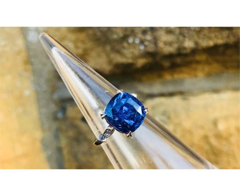 A Vivid Blue to Purple Art Deco-Style 9.15ct Colour-Change Natural Ceylon Sapphire &amp; Diamond Ring, the square cushion-cut