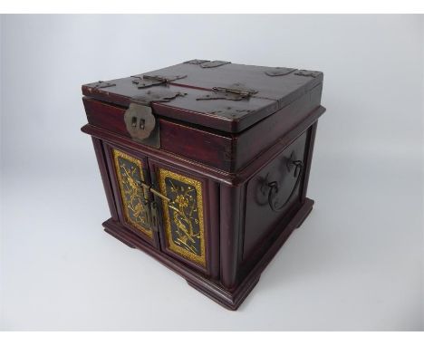 A Late 19th Century Chinese Wood Carved Jewellery Box, a hinged cover lifts to reveal a vanity mirror, double doors open to r