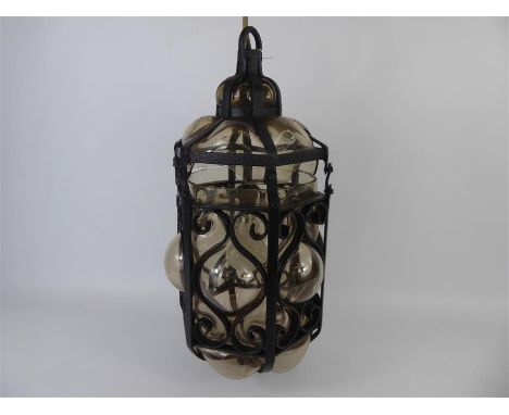 A Vintage Cast Iron and Glass Ceiling Lantern with bracket (af). Some loss evident to glass panels.