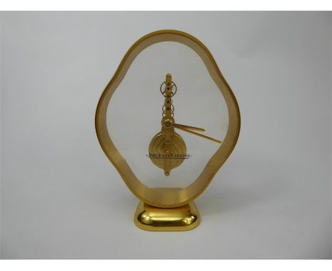A Vintage Jaeger LeCoultre Gilt Brass Cased Desktop Clock, having a 16 jewel visible skeleton movement, nr 3215 014 1 present