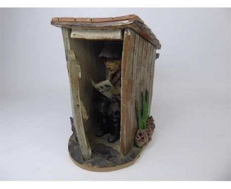 A Ceramic 'Geordie Netty'-Style, Figure in an Outhouse, approx 21 cms.