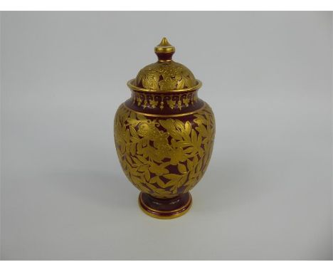 A 19th Century Royal Crown Derby Vase &amp; Cover, the ruby body beautifully decorated with gilded birds and butterflies amon