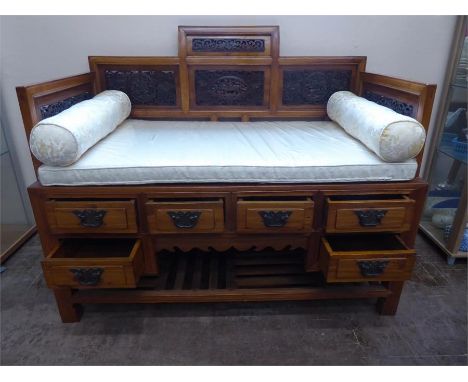 A Chinese Mid-20th Century Hard-Wood Bench, the twin-seat bench, benefits from six storage drawers and a lower shelf, approx 